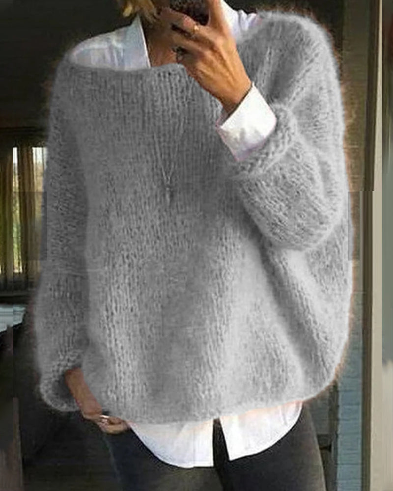 Women's relaxed textured knit sweater with crew neckline and long sleeves