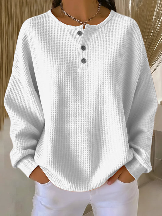 Women's long-sleeve waffle knit henley top with button placket