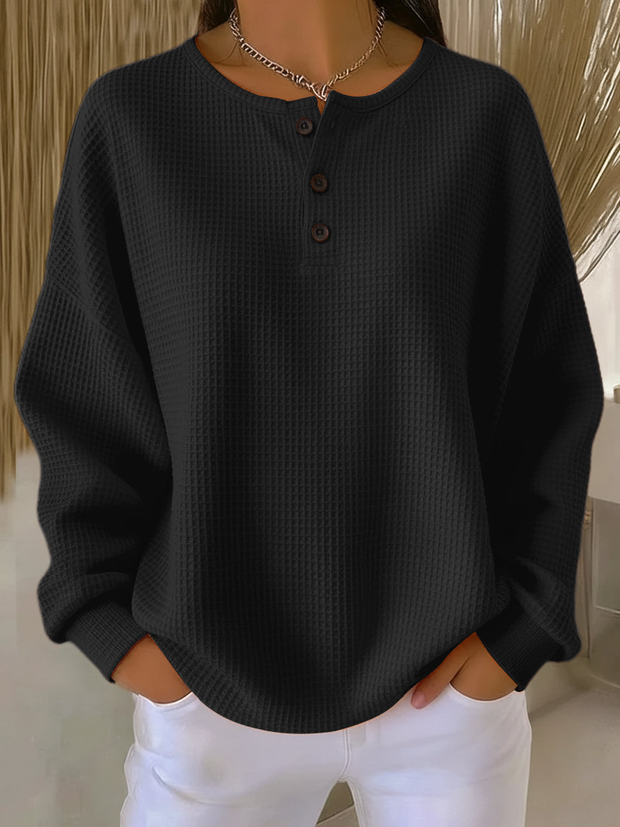 Women's long-sleeve waffle knit henley top with button placket