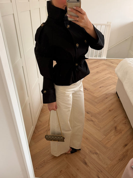 Women's black belted trench jacket with high collar and long sleeves