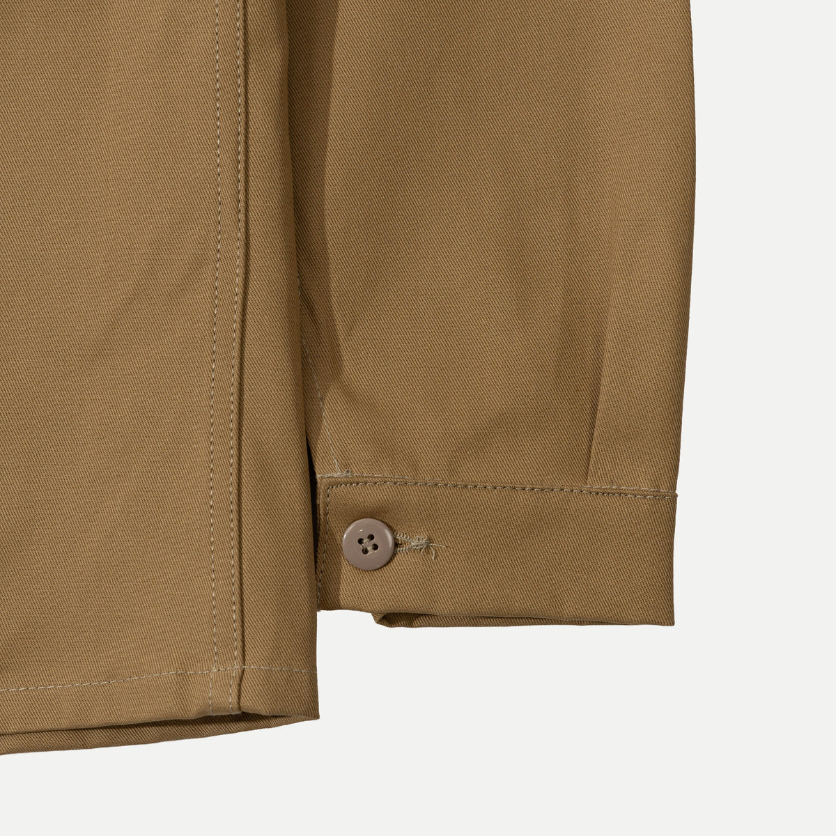 Men's brown utility jacket with point collar, button front and patch pockets