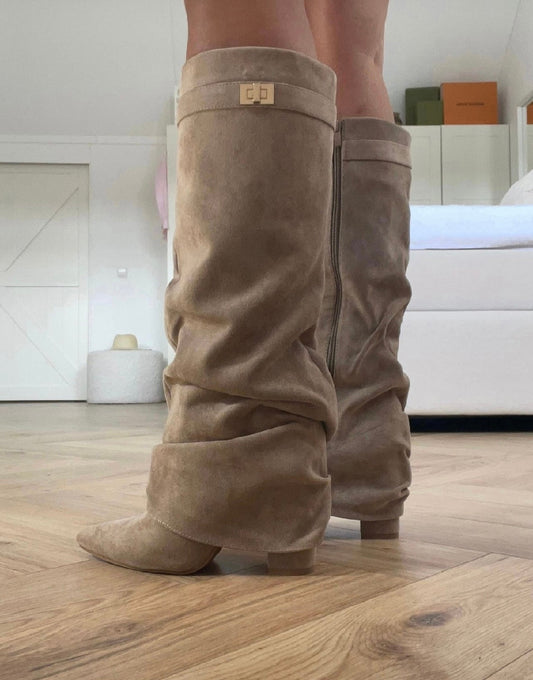 Women's taupe slouch knee-high boots with pointed toes, low heels, side zips and buckle trim
