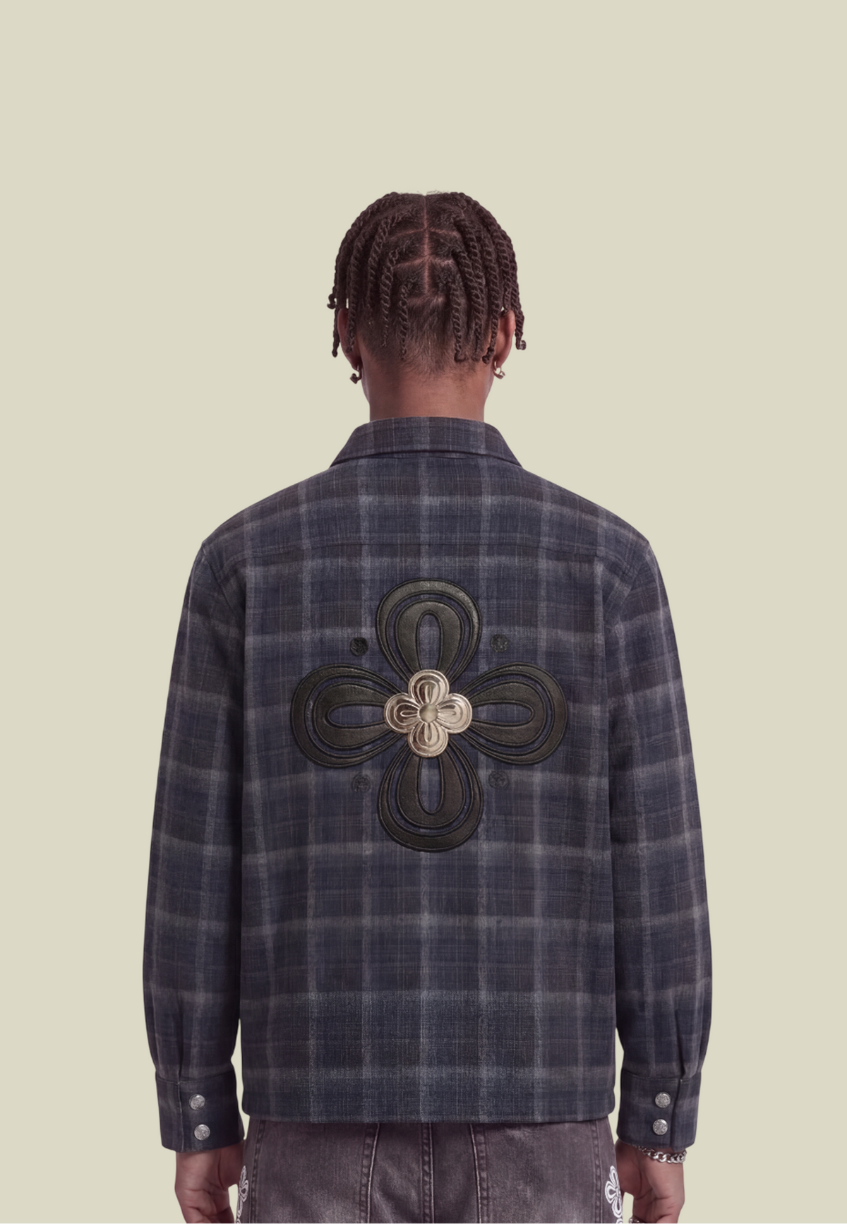 Men's navy plaid long-sleeve shirt with button front, chest pocket and decorative back motif