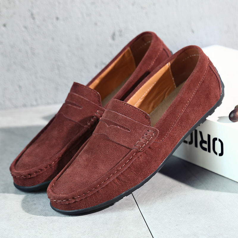Men's slip-on loafers with moc toe and penny strap detail