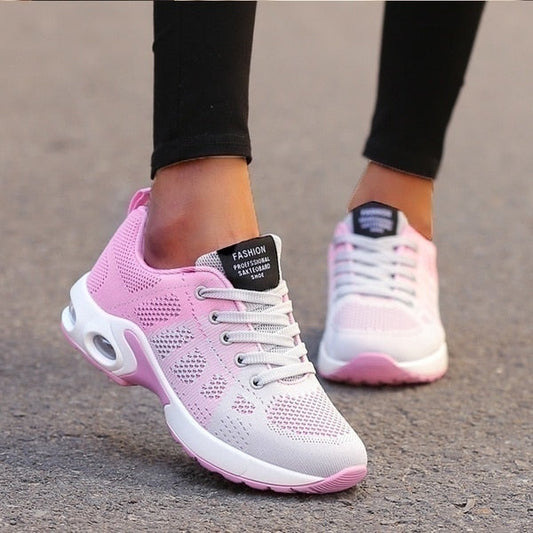 Women's lace-up sneakers with perforated panels and air cushion sole