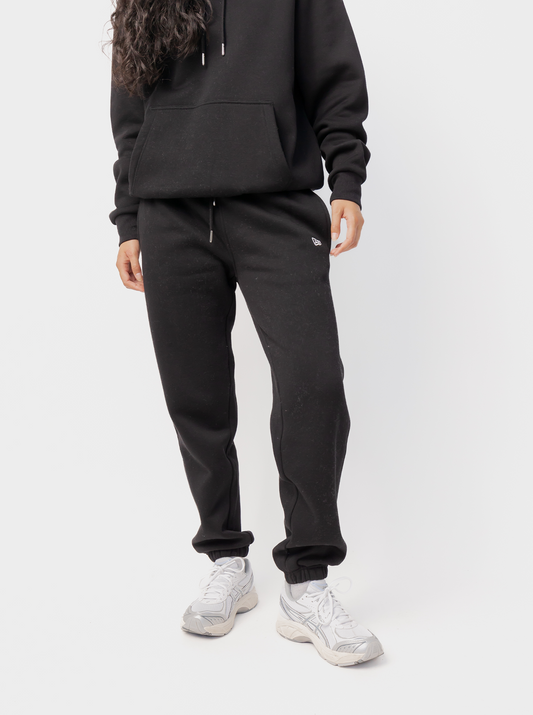 Women's black tapered logo jogger pants with drawstring waist and elasticated cuffs