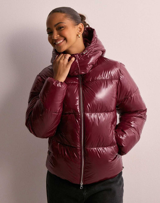 Women's glossy quilted hooded puffer jacket with front zipper and side pockets