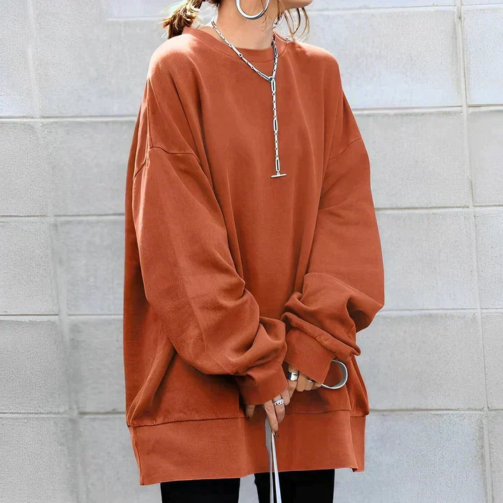 Women's oversized crew neck tunic sweater with long sleeves and ribbed trims