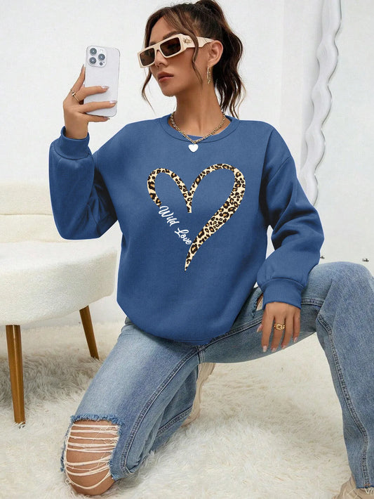 Women's sweatshirt with leopard-print heart graphic, crew neckline and long sleeves