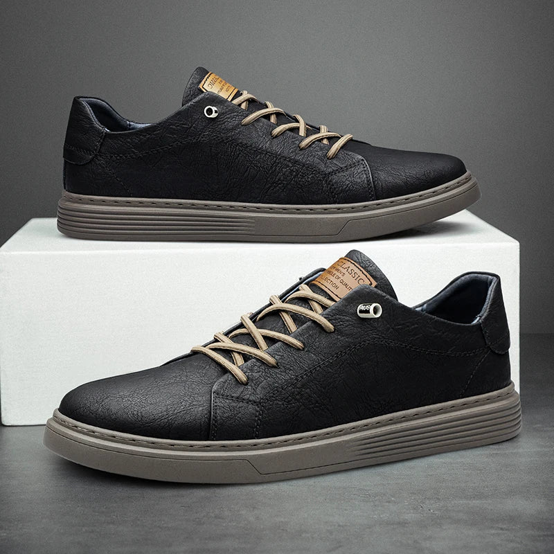 Men's low-top lace-up sneakers with stitched panels and a layered flat sole