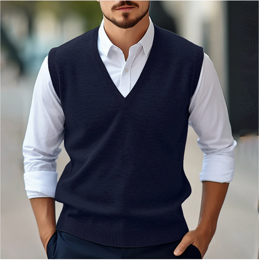 Men's sleeveless V-neck sweater vest with ribbed trims layered over a white shirt