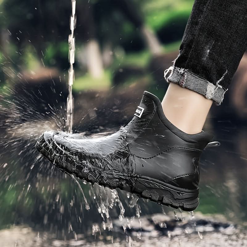 Ankle boots with pull tabs, stitched panels and lug soles