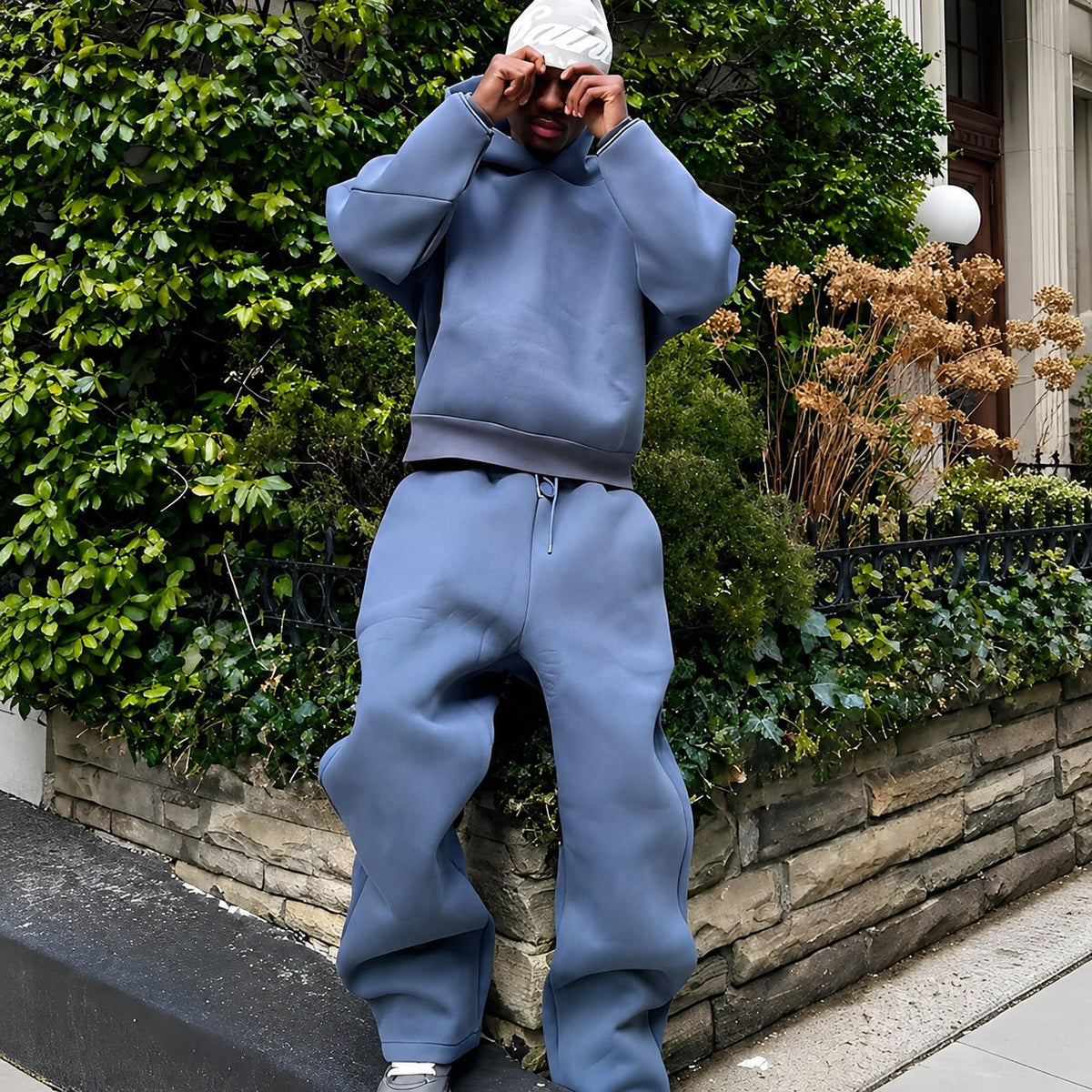 Men's hooded sweatshirt and jogger set with relaxed trousers
