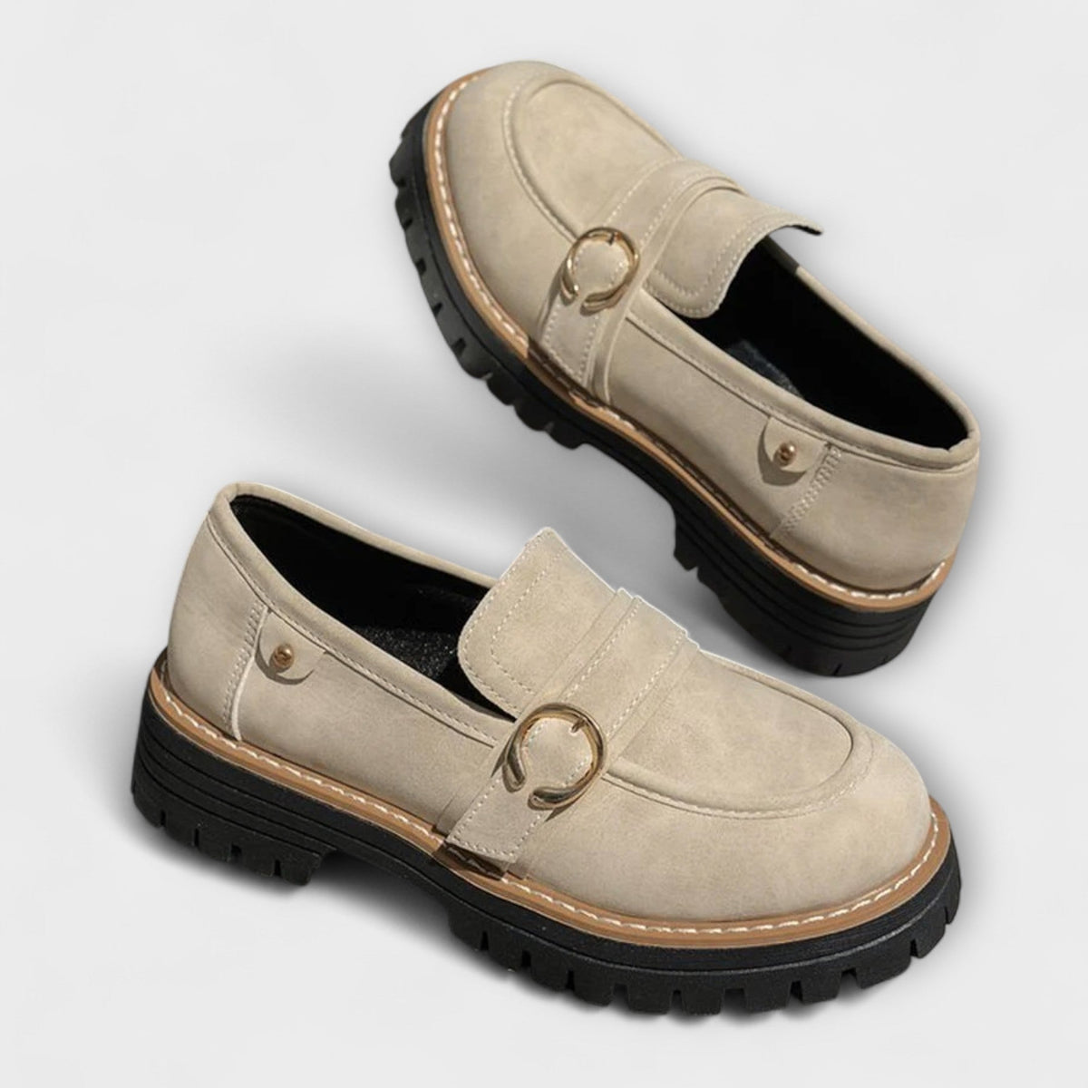 Women's round-toe loafers with metal ring trim and chunky lug soles