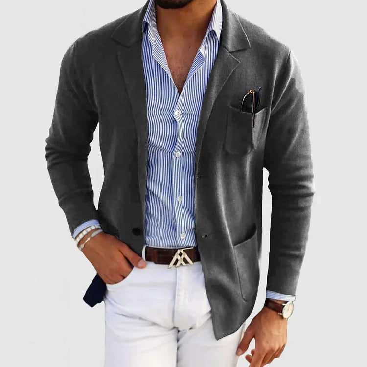 Men's solid blazer with notched lapels, long sleeves, buttons and front pockets