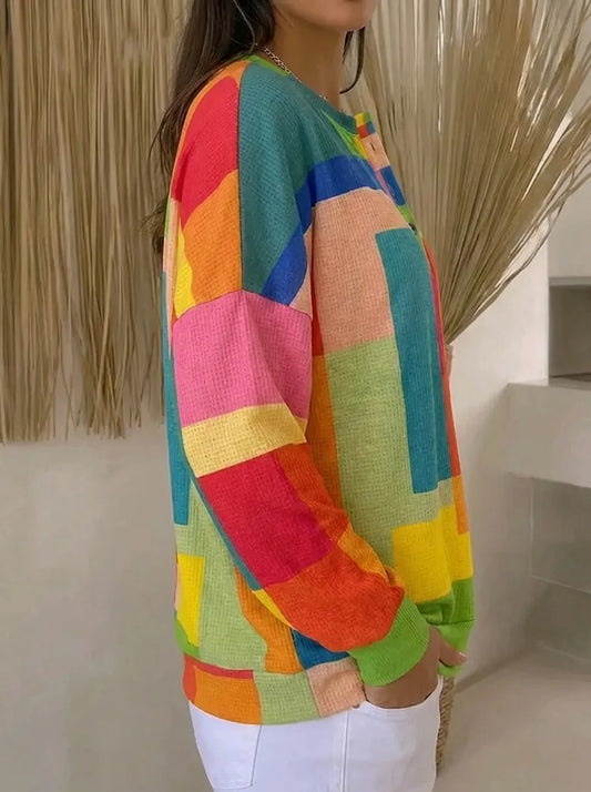 Women's multicolored geometric color block sweater with round neck and long sleeves