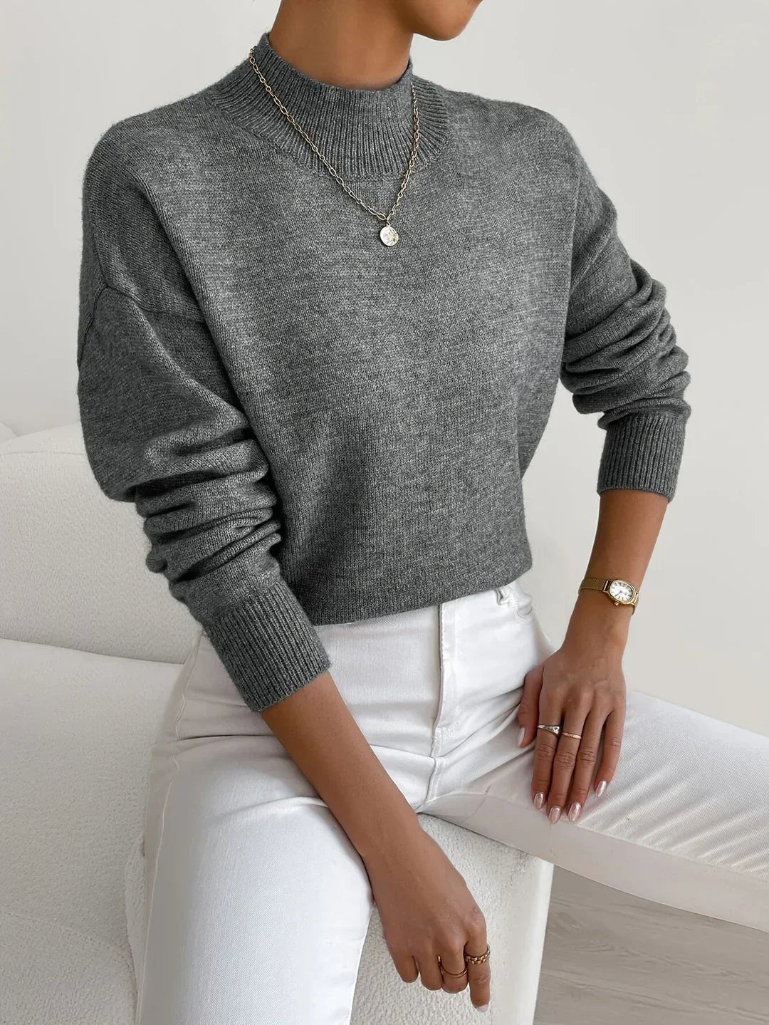 Women's relaxed mock turtleneck sweater with long sleeves and ribbed trims