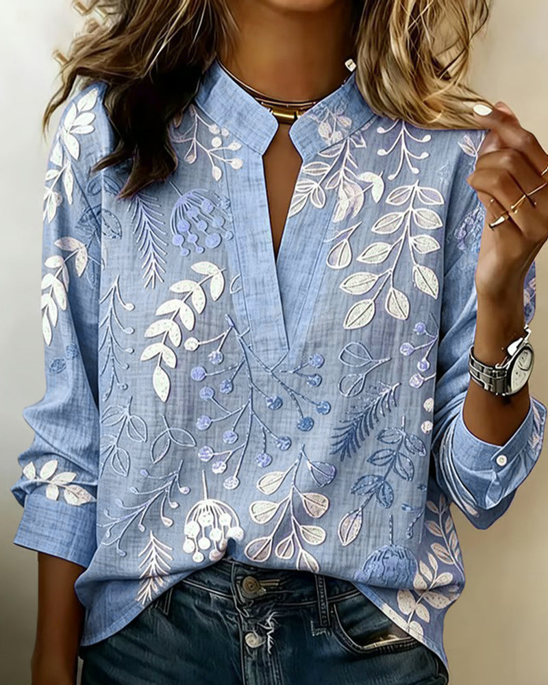 Women's botanical print blouse with notched collar and 3/4 sleeves