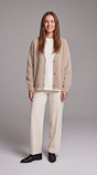 Women's beige fluffy knit cardigan with V-neck and button front