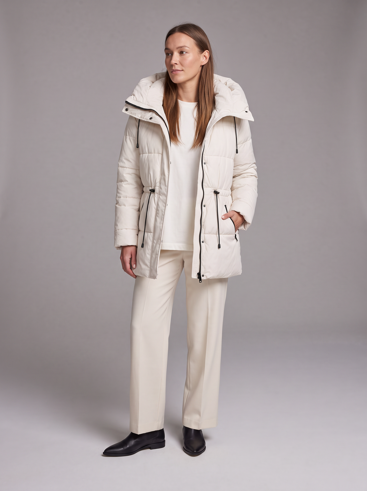 Women's beige quilted hooded puffer coat with drawstring waist and front pockets