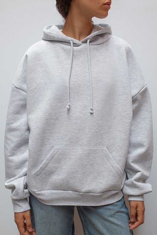 Women's gray hoodie with drawstring hood and silver sequin wings on the back