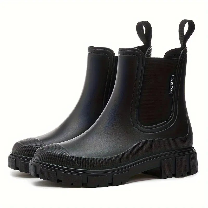 Women's slip-on Chelsea boots with elastic side panels, pull tabs and chunky lug soles