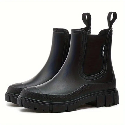 Women's slip-on Chelsea boots with elastic side panels, pull tabs and chunky lug soles