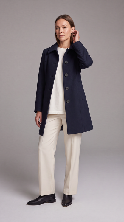 Women's fit and flare trench coat with pointed collar and button front