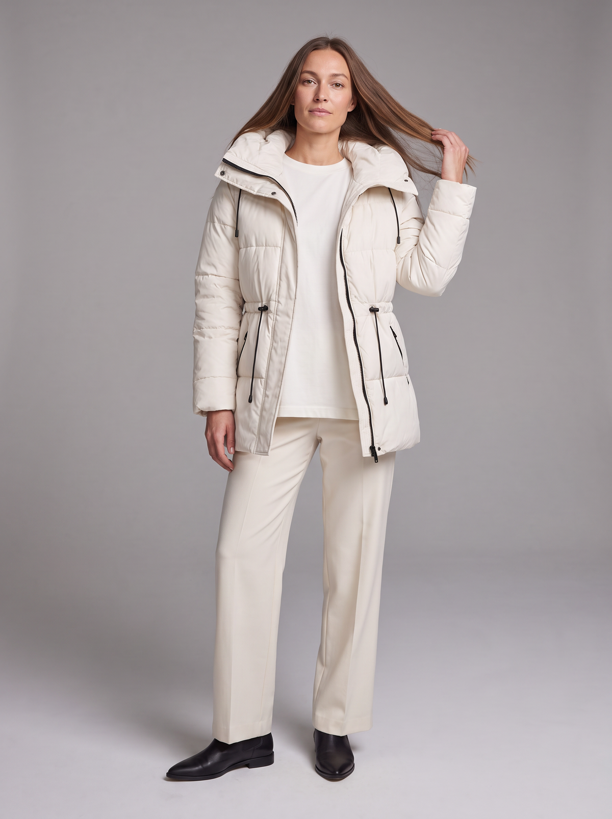 Women's beige quilted hooded puffer coat with drawstring waist and front pockets