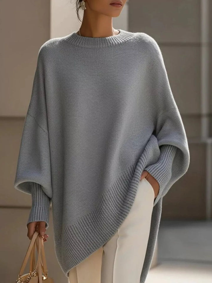 Women's oversized sweater with wide sleeves and ribbed cuffs