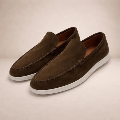 Men's slip-on moc toe loafers with stitched trim and light soles