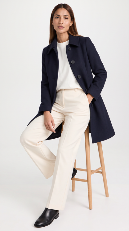 Women's fit and flare trench coat with pointed collar and button front