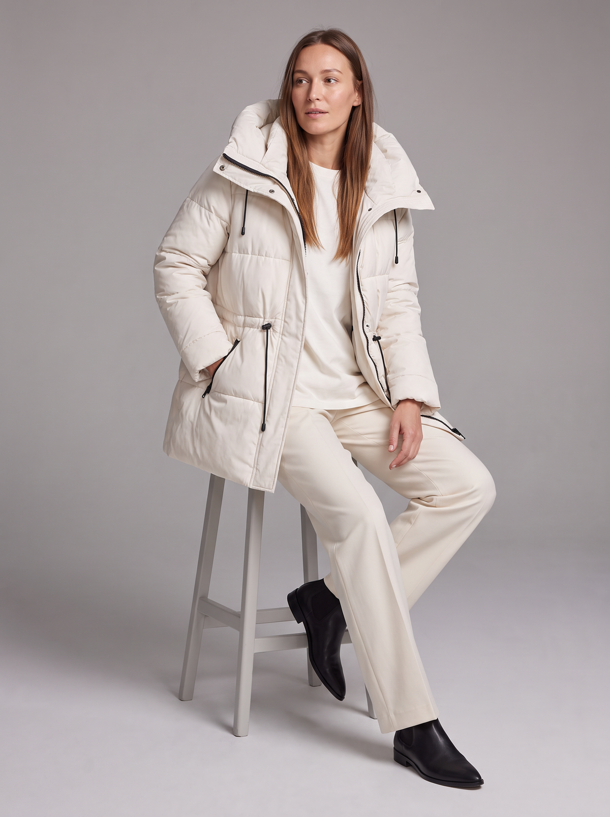 Women's beige quilted hooded puffer coat with drawstring waist and front pockets
