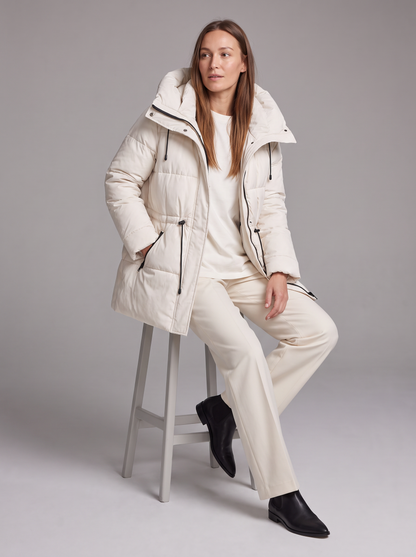 Women's beige quilted hooded puffer coat with drawstring waist and front pockets