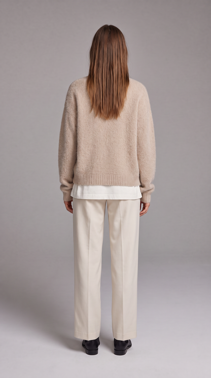 Women's beige fluffy knit cardigan with V-neck and button front