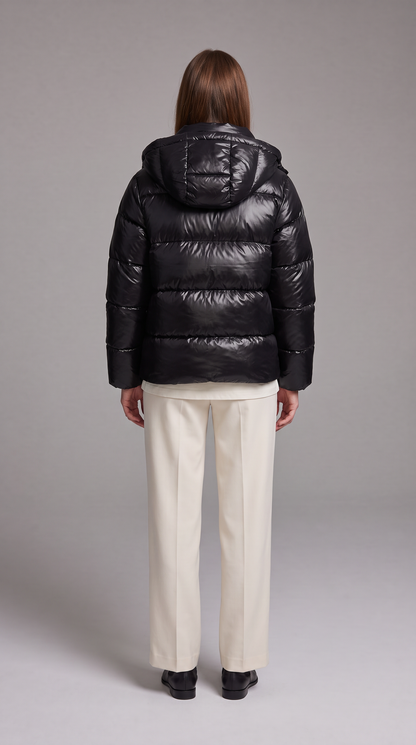 Women's hooded quilted puffer coat with long sleeves and zip front