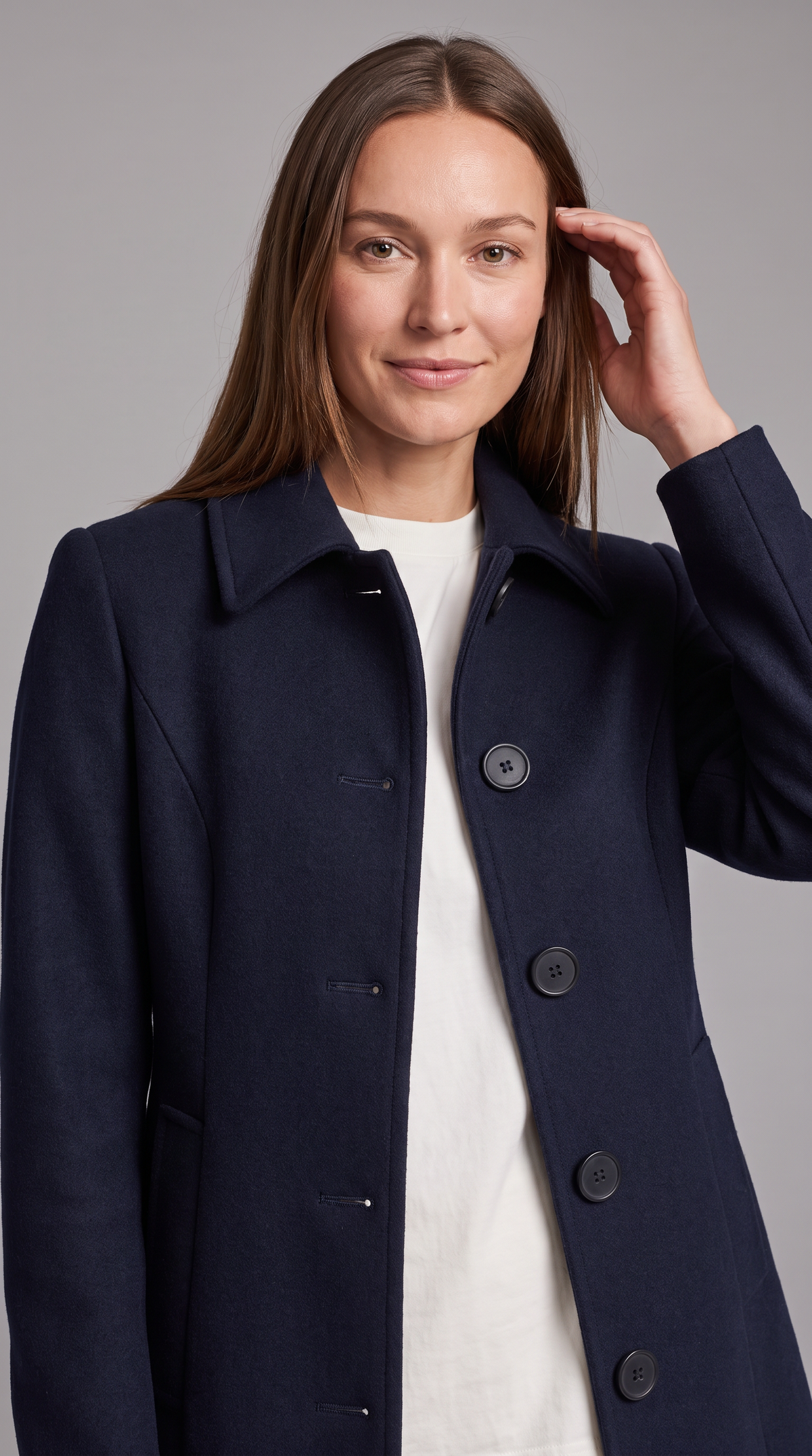 Women's fit and flare trench coat with pointed collar and button front