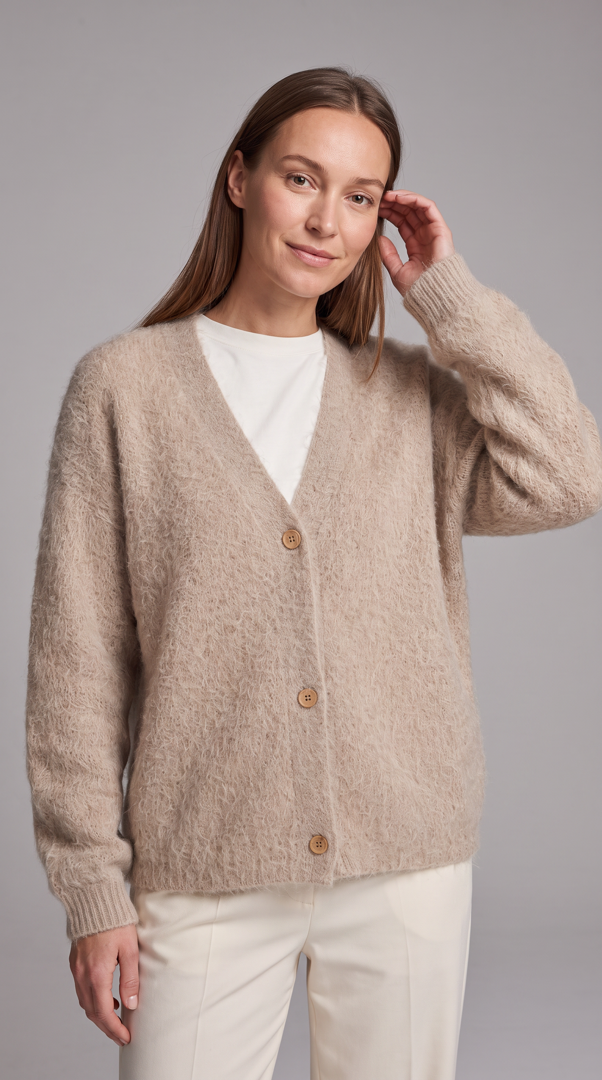 Women's beige fluffy knit cardigan with V-neck and button front