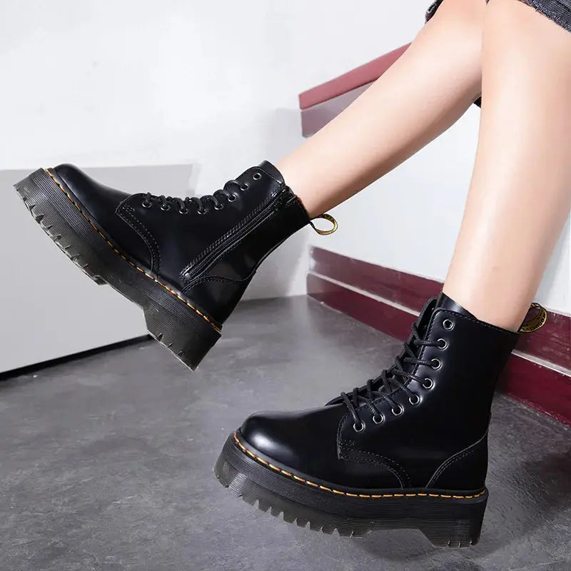 Women's black lace-up combat boots with platform sole