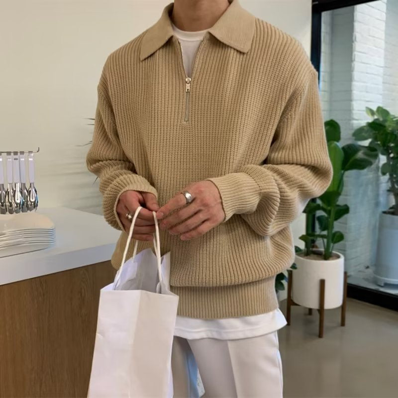 Men's quarter zip rib knit sweater with collared neckline and long sleeves