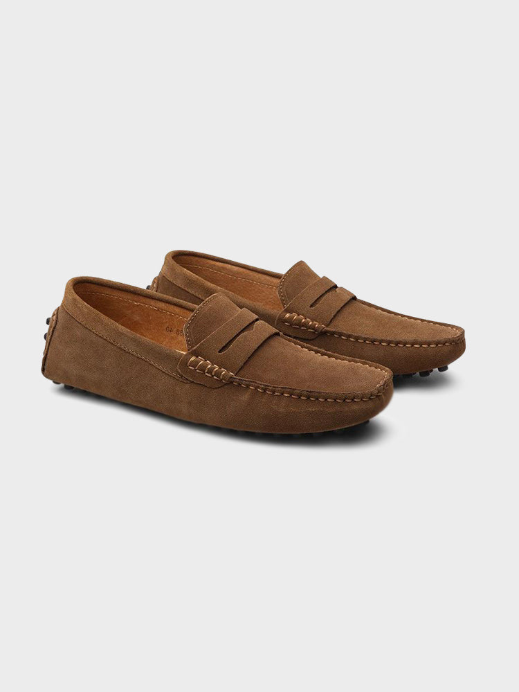 Suede boat loafers with moc stitching and penny-style straps