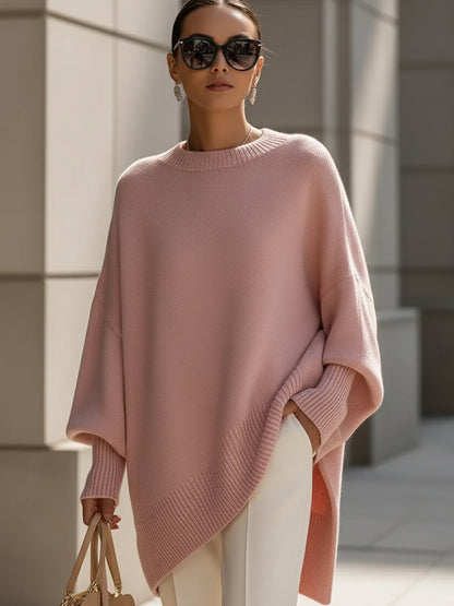 Women's oversized knit sweater with crew neck and asymmetric longline hem