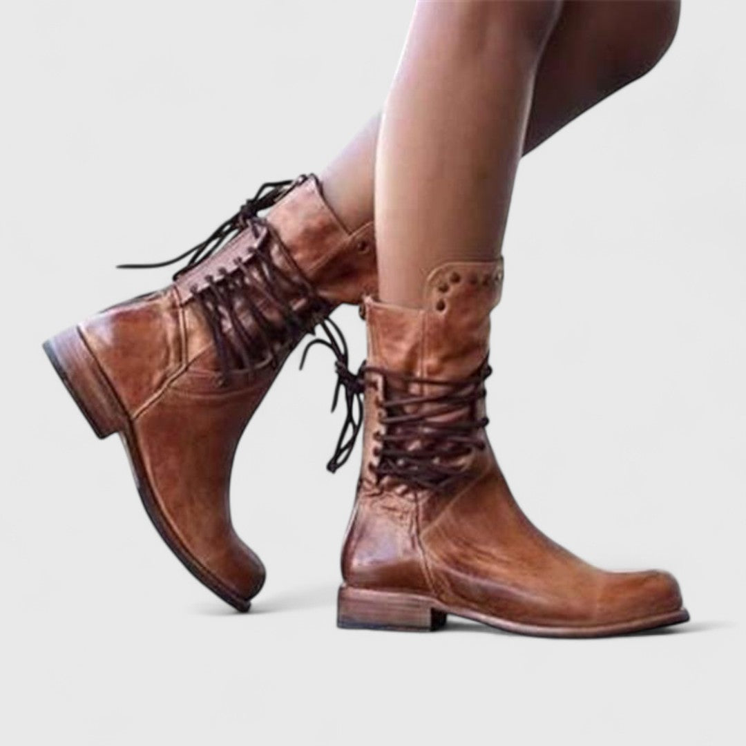 Women's lace-up mid-calf boots with studded cuffs and low block heels