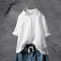Women's collared shirt with ruffled cuffs and hem