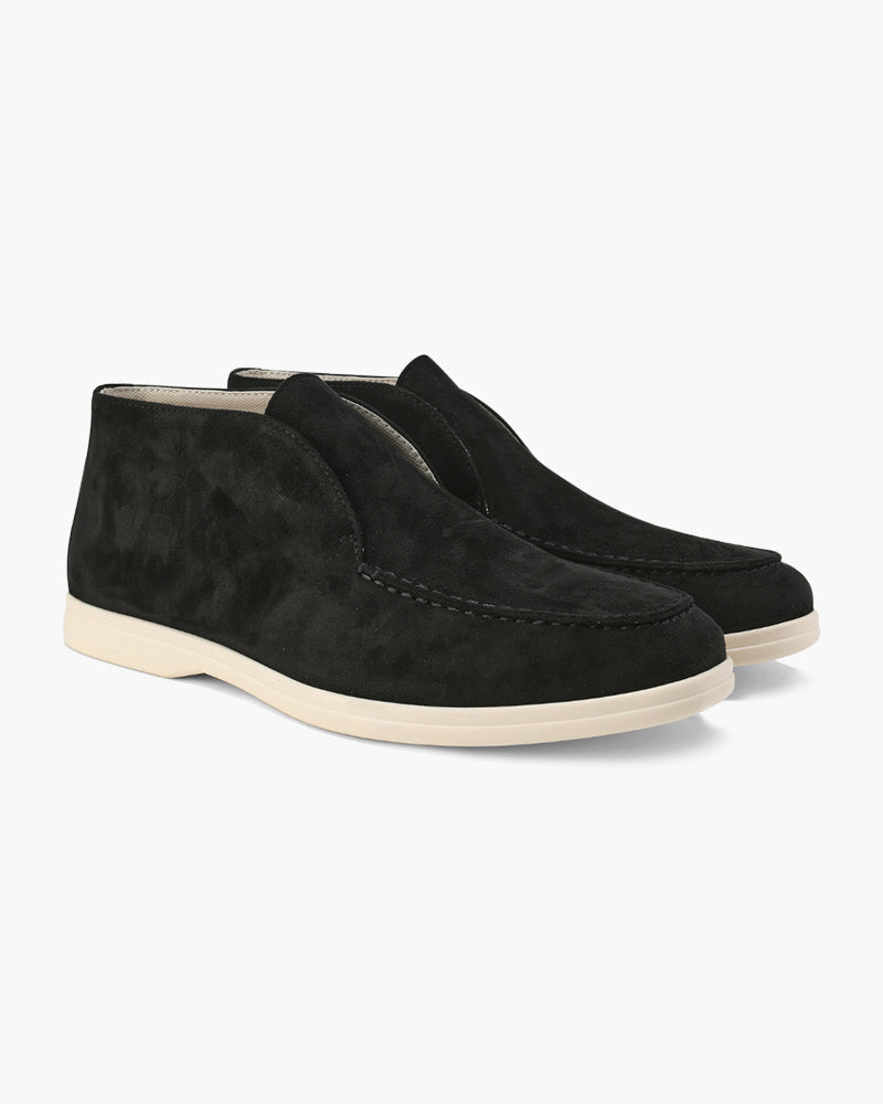 Ankle-height slip-on loafers with rounded toes, stitched apron detailing and flat contrasting soles