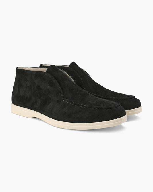 Ankle-height slip-on loafers with rounded toes, stitched apron detailing and flat contrasting soles