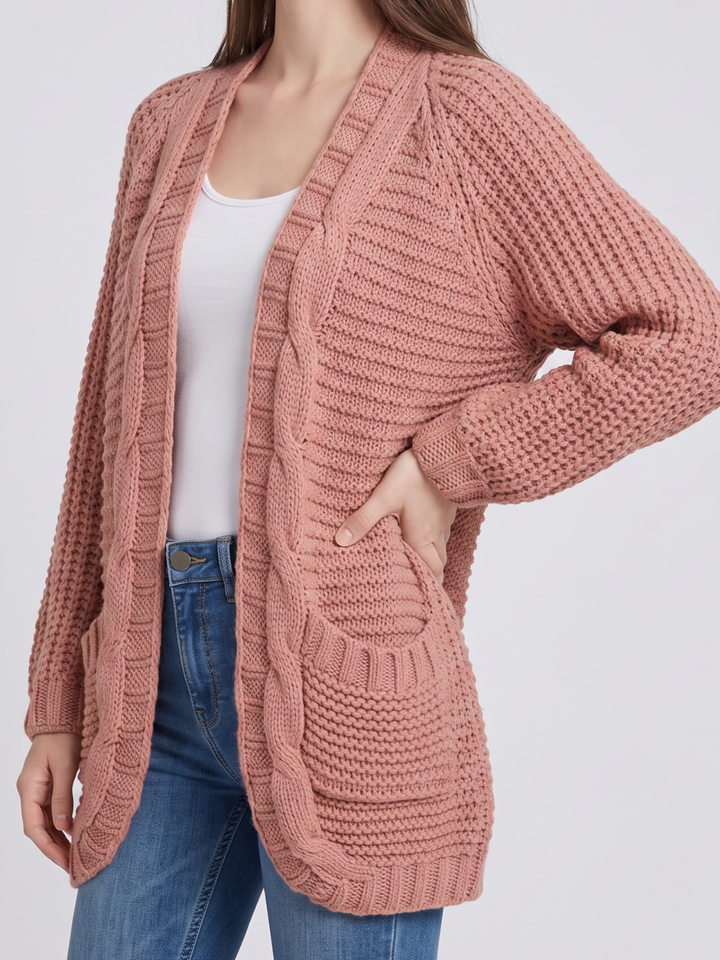 Women's oversized cable knit cardigan with open front and patch pockets