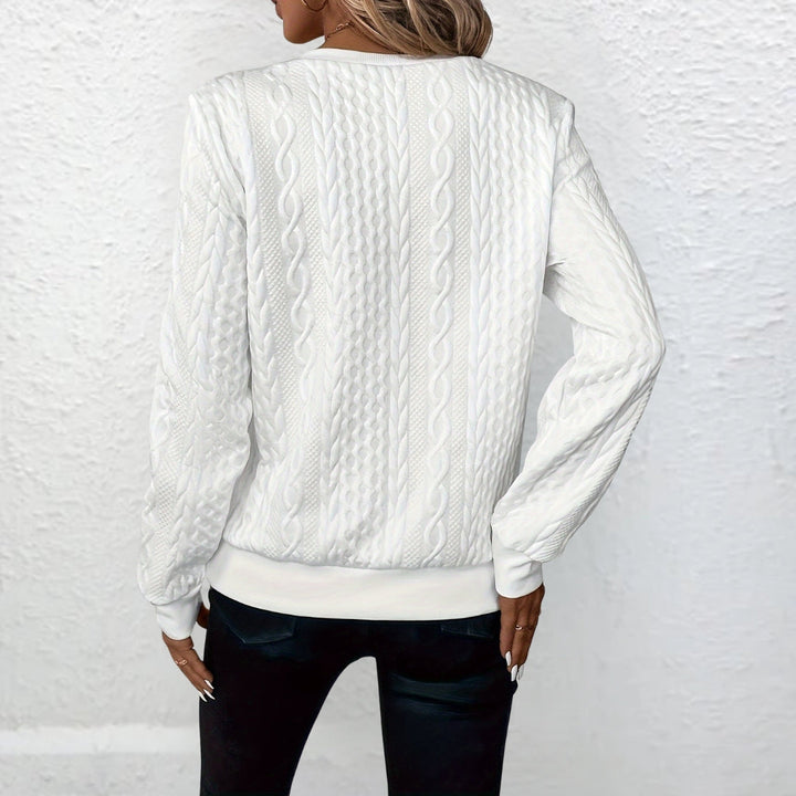 Women's textured knit sweater with quarter zip and ribbed trims
