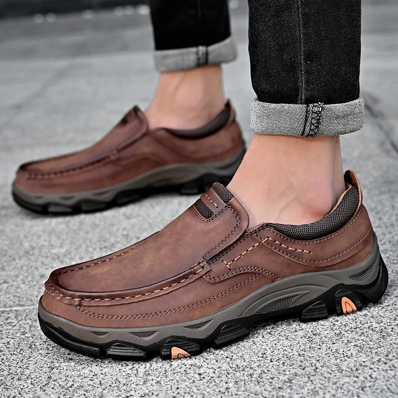 Men's casual moc toe loafers with stitched detailing and textured soles