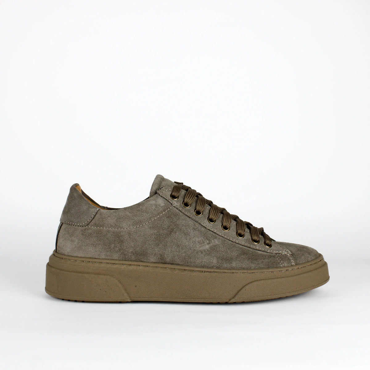 Taupe low-top lace-up sneakers with stitched panels and platform soles
